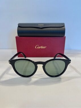 Cartier Black Frame Sunglasses with Green Lenses